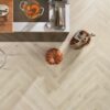 Diagonal wood flooring design in a kitchen