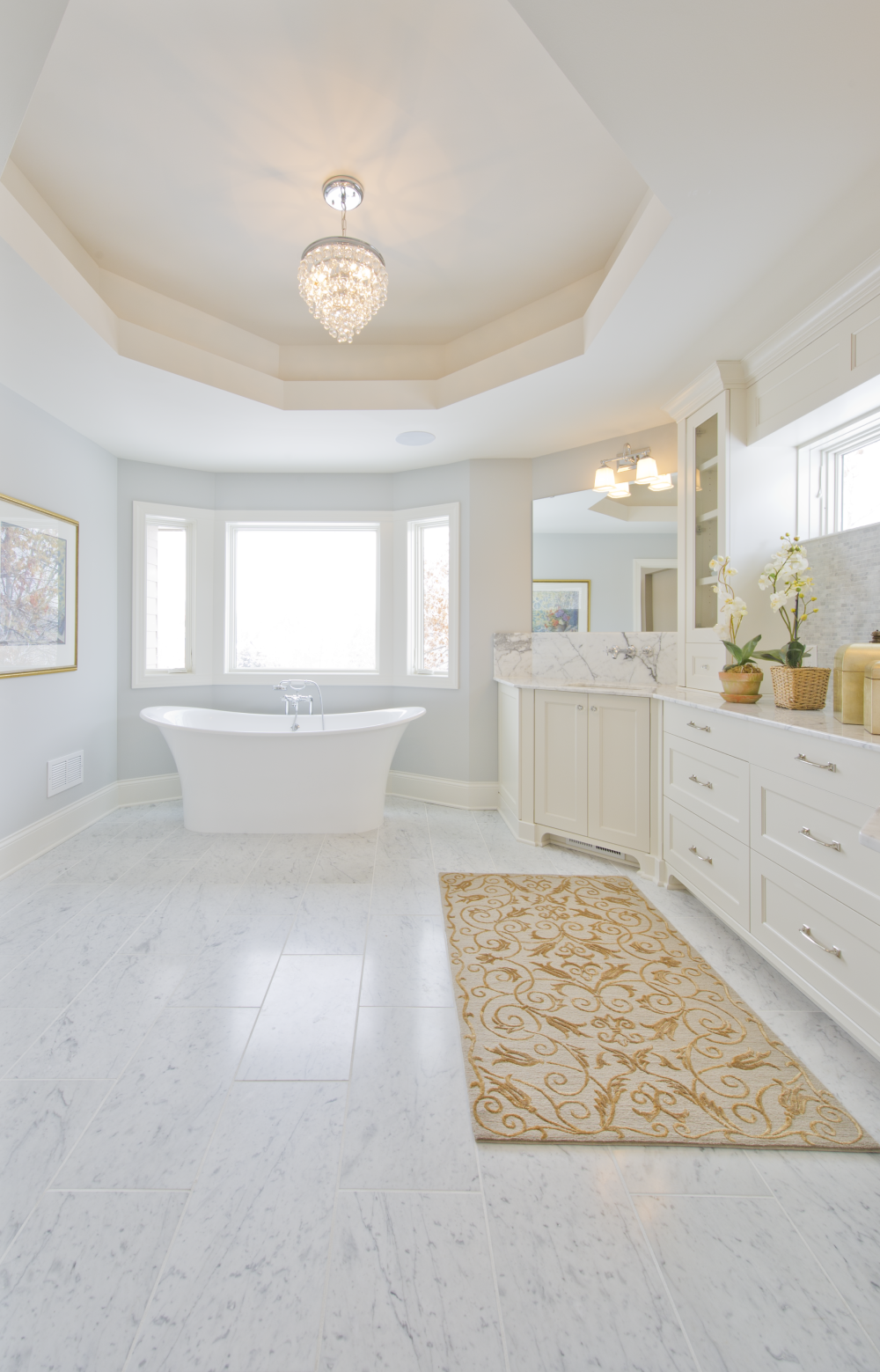 A bathroom with white tile flooring and yellow accents