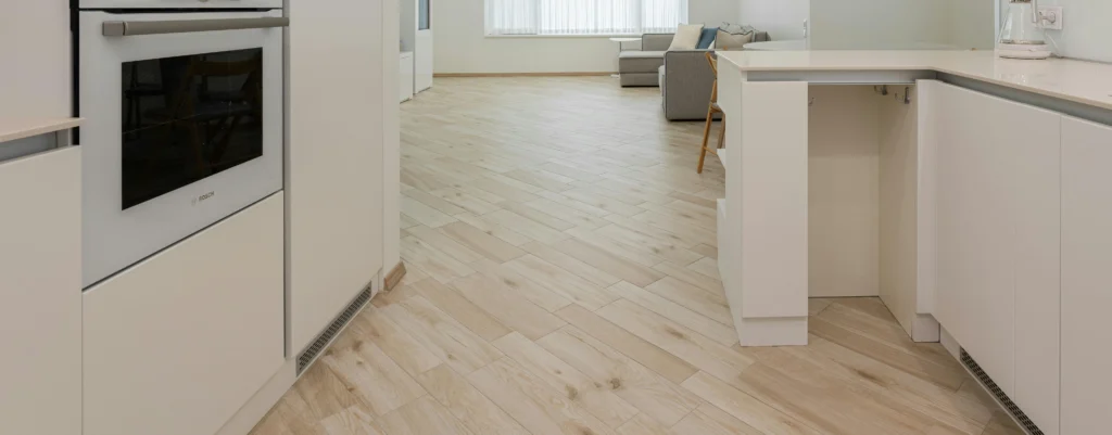 diagonal tile layout with wood-look tiles on a kitchen floor