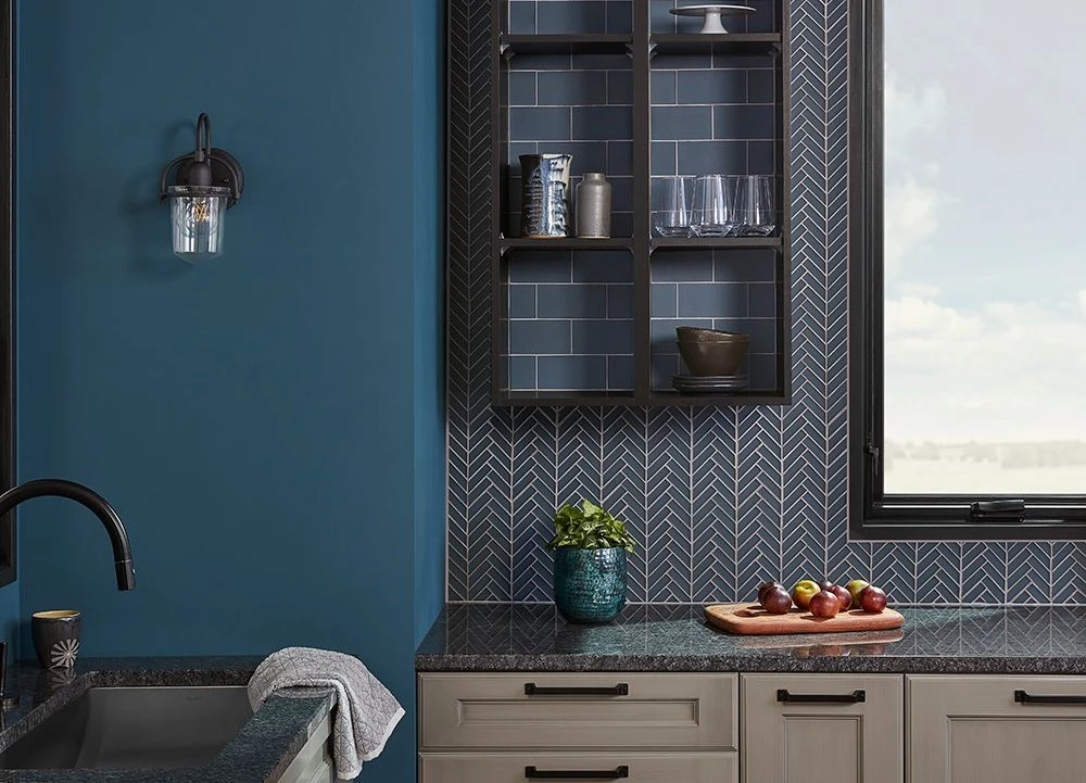Dark blue Chapter 6 Reef Glass tile from Jeffrey Court on a bathroom backsplash