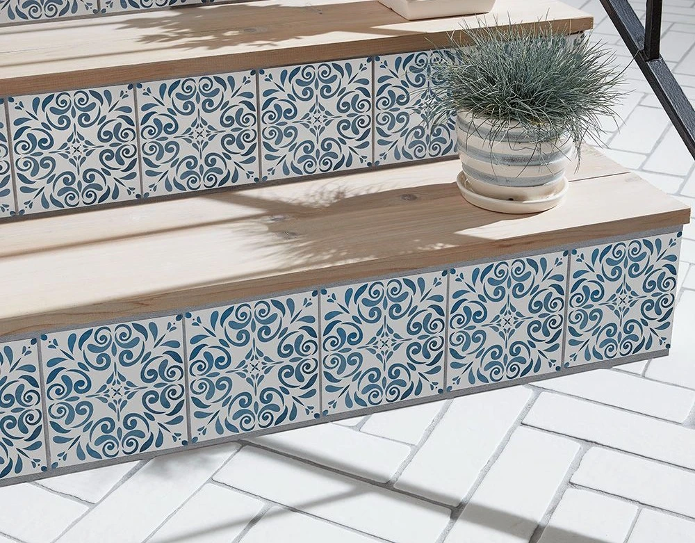 Patterned blue tile on stair risers from Chapter 8 Europa Arte by Jeffrey Court